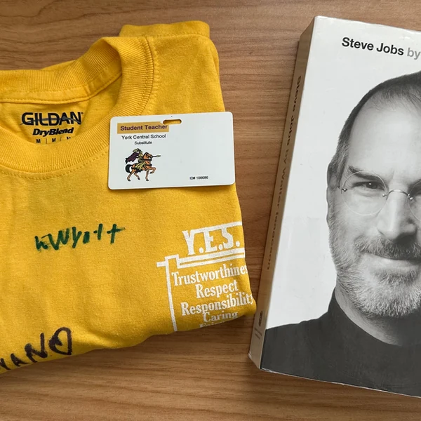 T-shirt signed by students and Steve Jobs book